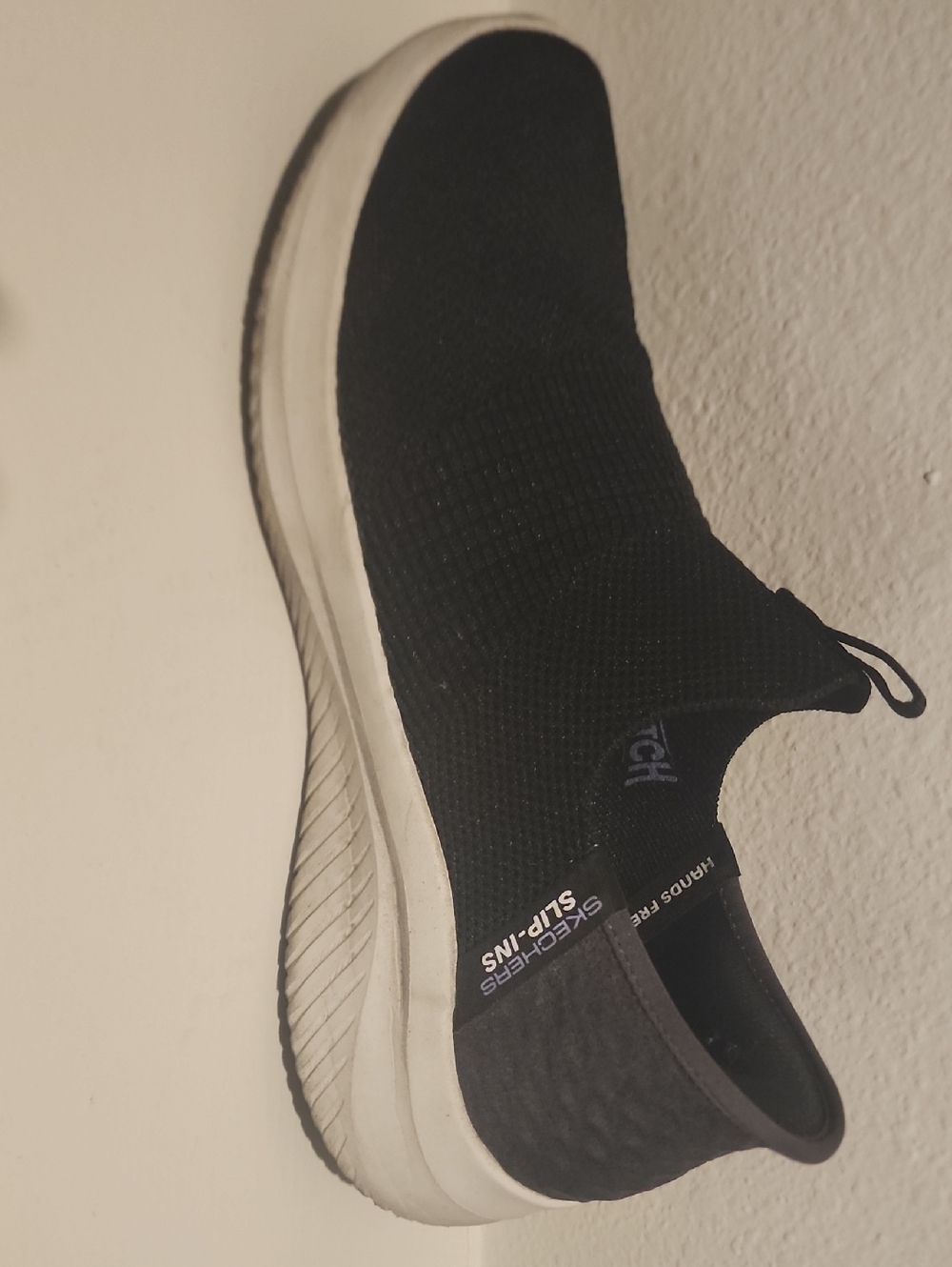 Skechers Black Slip-Ons with White Midsole